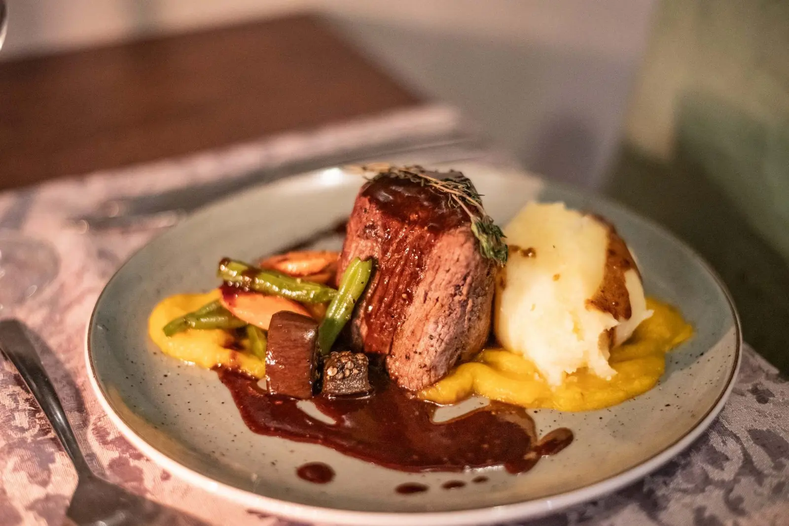Chef-prepared main course at The Grove Restaurant