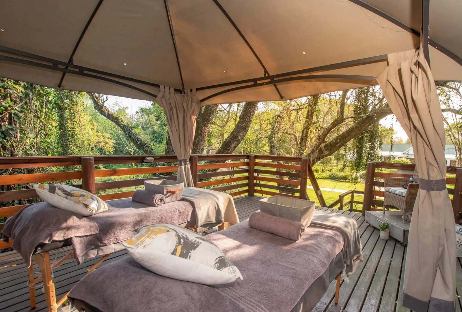 Beloved Beauty Spa treatment deck among the trees